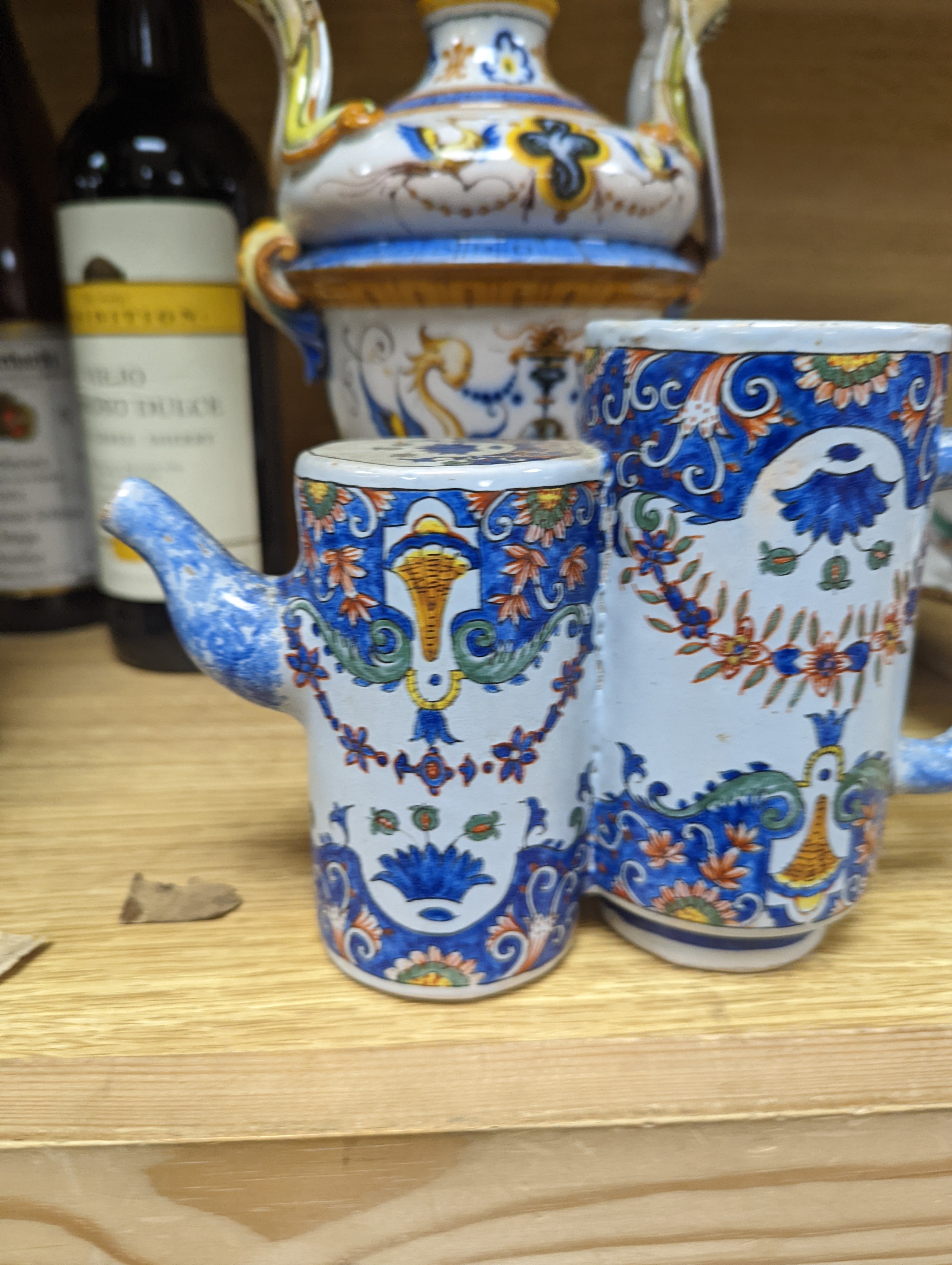 A Ginori maiolica two handled vase and Delft polychrome double cylinder teapot 27cm